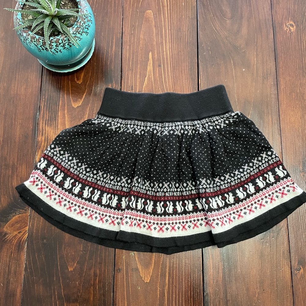 Girls knitted winter skirt with squirrel pattern